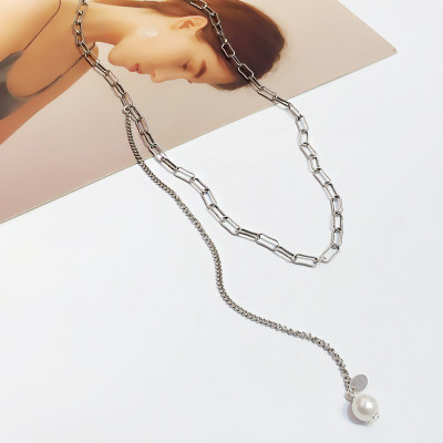 Dây chuyền titan thả tua rua ngọc trai độc đáo