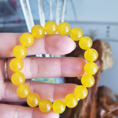 Chiếc Vòng tay đá mã não vàng anh tươi quá đẹp  Size hạt 10mm Nữ mệnh kim thổ thủy đeo  Vòng vàng anh này người lớn trẻ em nhỏ đeo được hết ạ rất là xinh xắn luôn