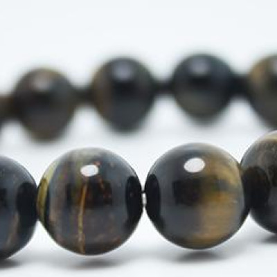 Vòng tay phong thủy đá mắt hổ nâu MS117