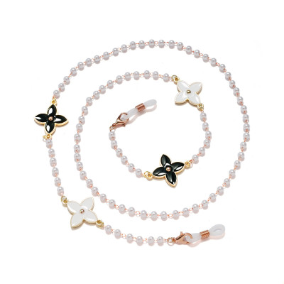 Chain kính dây đeo mắt kiếng cỏ bốn lá đen chanh xả chuỗi ngọc trai dây chuyền đeo tai nghe bluetooth chống rơi rớt