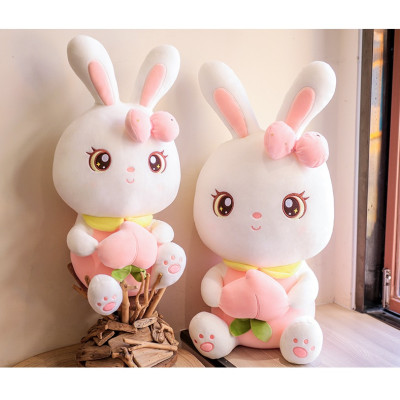 Thỏ nhồi bông ôm trái đào cao cấp