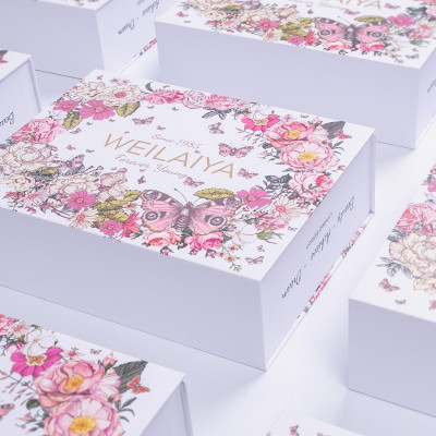 Set quà tặng cao cấp WEILAIYA: Combo Sữa tắm Hoa Trà và Tẩy tế bào chết body