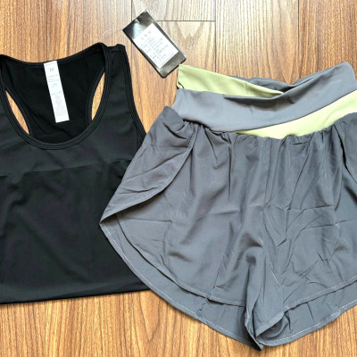 Bộ đồ thể thao nữ gồm áo ba lỗ khoét lưng và quần đùi 2 lớp hàng Quảng Châu cao cấp