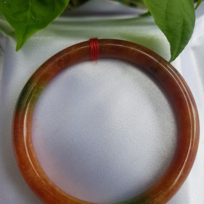 Vòng Mã Não Tứ Quý đỏ xanh bông Ni 55mm chột 7mm nặng 54kg đến 62kg đeo đẹp sẽ giúp cho bạn trông thật nổi bật và thu hút mọi ánh nhìn xung quanh đấy ạ