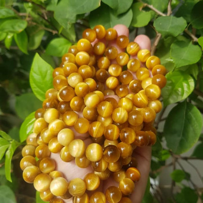 Vòng Tay Phong Thủy Đá Mắt Hổ tự nhiên  Size 10mm loại Bóng Đẹp  Chuẩn Hợp Nữ mệnh Kim Thổ Thủy đeo lên tay bóng đẹp sang, tốt sức khỏe hợp tuổi hợp mệnh hợp làm ăn ạ