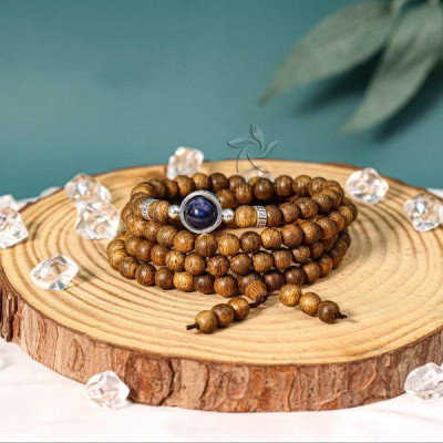 Vòng tay trầm hương 108 Ngân Tú Bảo Trầm hạt - Charm bạc S925 và đá phong thủy 