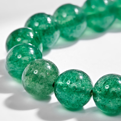 Vòng tay thạch anh dâu xanh phối charm phật bạc (8mm) Ngọc Quý Gemstones