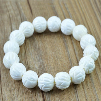 VÒNG TAY ĐÁ TRẮNG KHẮC HOA SEN TÂM BÌNH AN