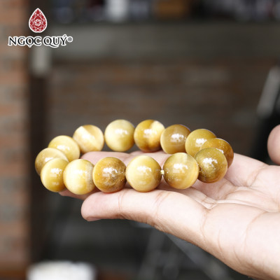 Vòng tay trơn đá thạch mắt hổ vàng tâm size hạt mệnh thổ , kim - Ngọc Quý Gemstones